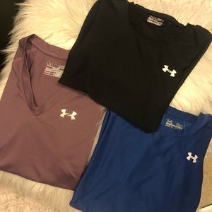 3 Underarmour shirts 2 are small 1 is XS